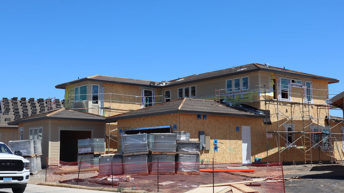 Finished custom home roof on a house exterior